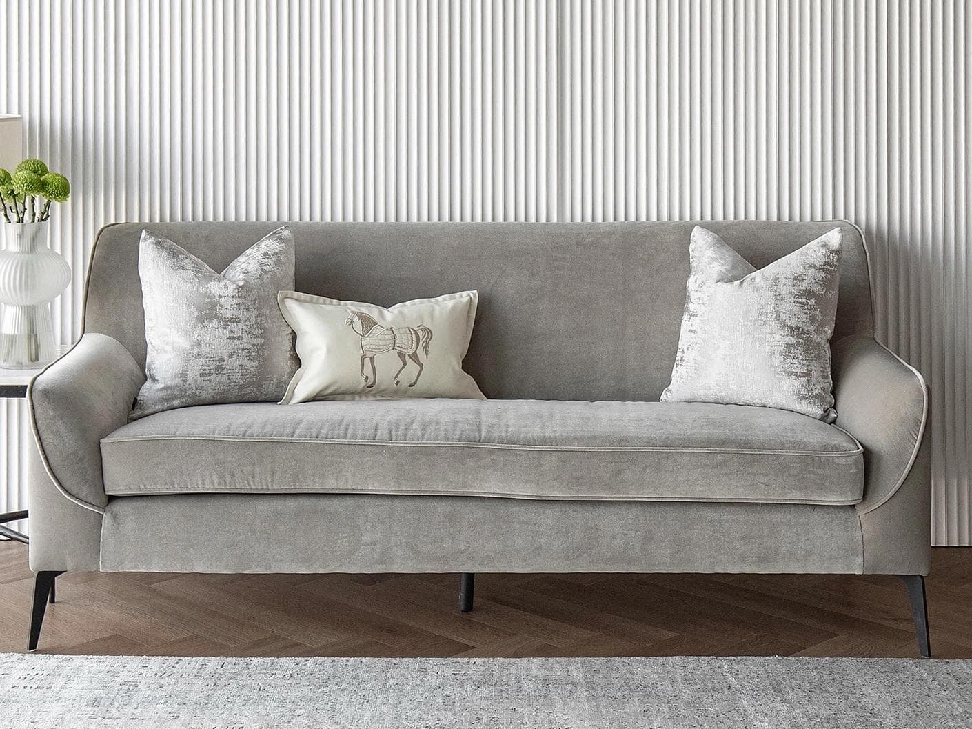 Klaus Bundle cushion in silver, grey and white, shown in a lifestyle front view as image 4