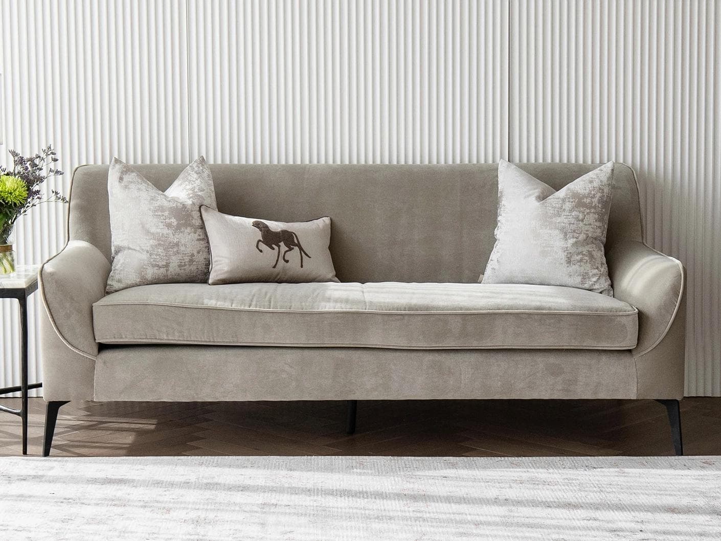 Rhenzy Bundle cushion in silver, grey, brown and beige, shown in a lifestyle front view as image 4