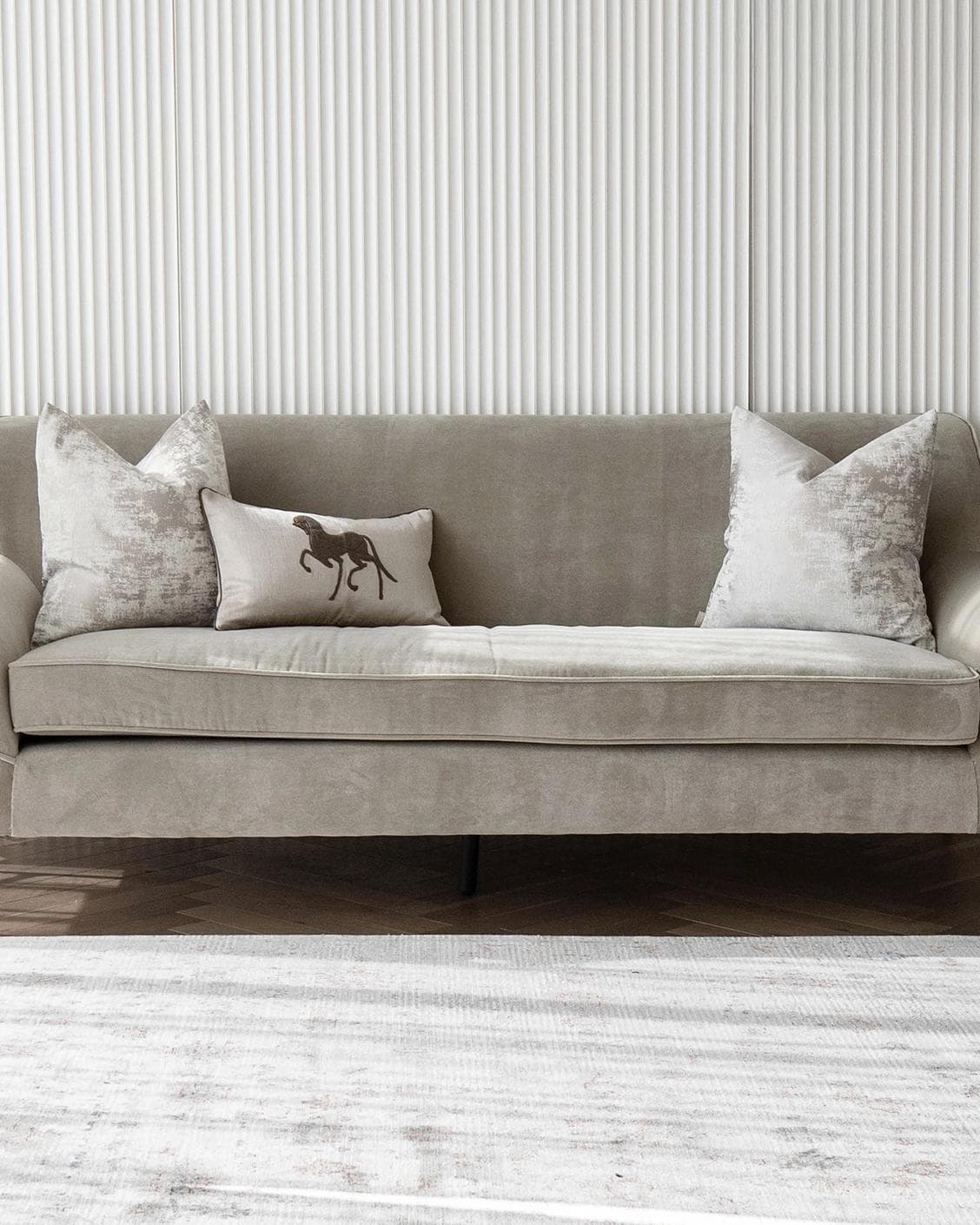 Rhenzy Bundle cushion in silver, grey, brown and beige, shown in a lifestyle front view as image 4