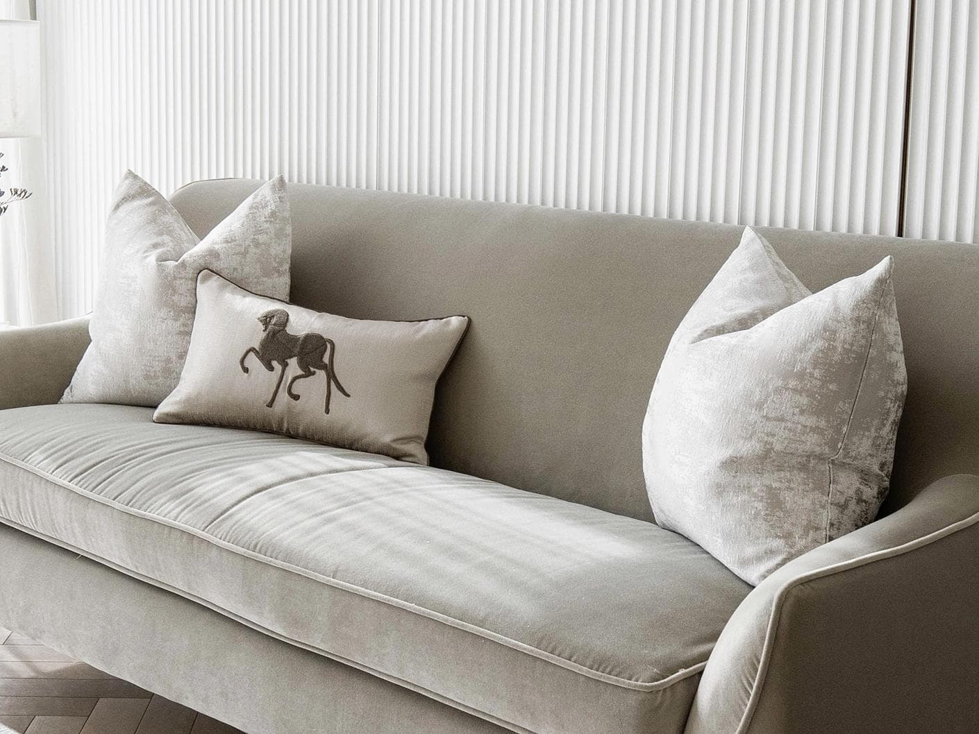 Rhenzy Bundle cushion in silver, grey, brown and beige, shown in a lifestyle right view as image 2