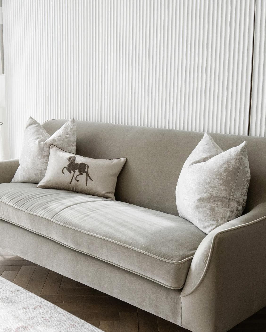 Rhenzy Bundle cushion in silver, grey, brown and beige, shown in a lifestyle right view as image 2