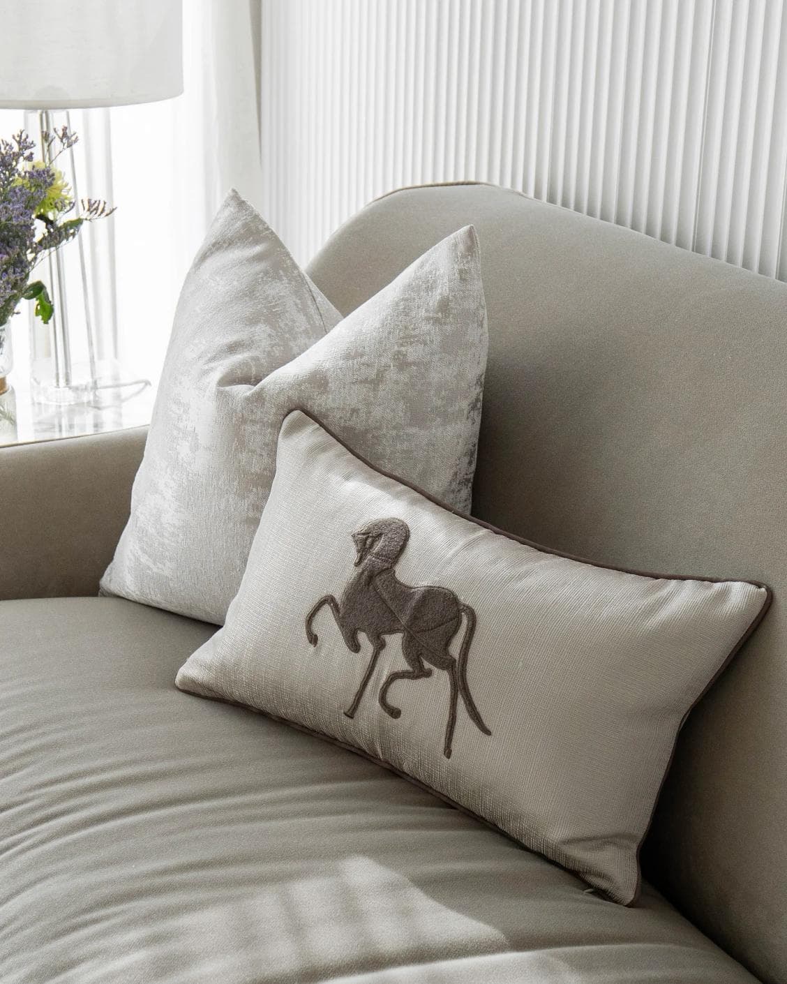 Rhenzy Bundle cushion in silver, grey, brown and beige, shown in a product right view as image 5
