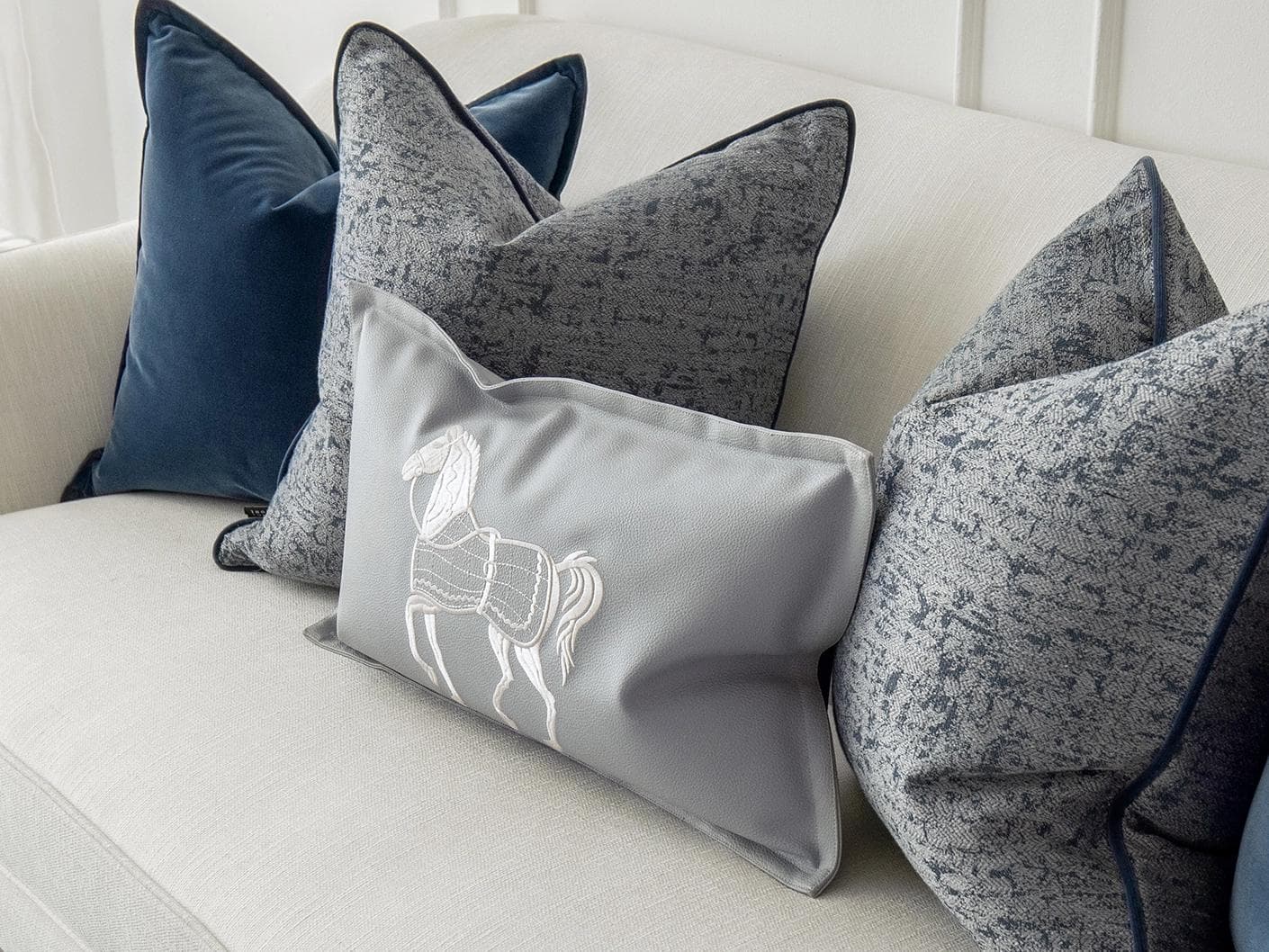 John Bundle cushion in blue, silver and white, shown in a product right view as image 5