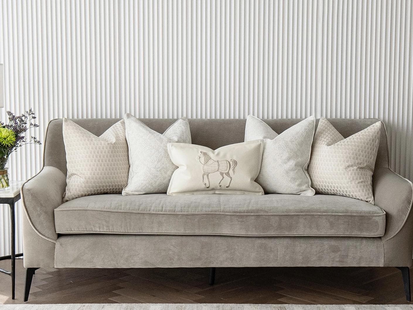 Carmi Bundle cushion in white and beige, shown in a lifestyle front view as image 4