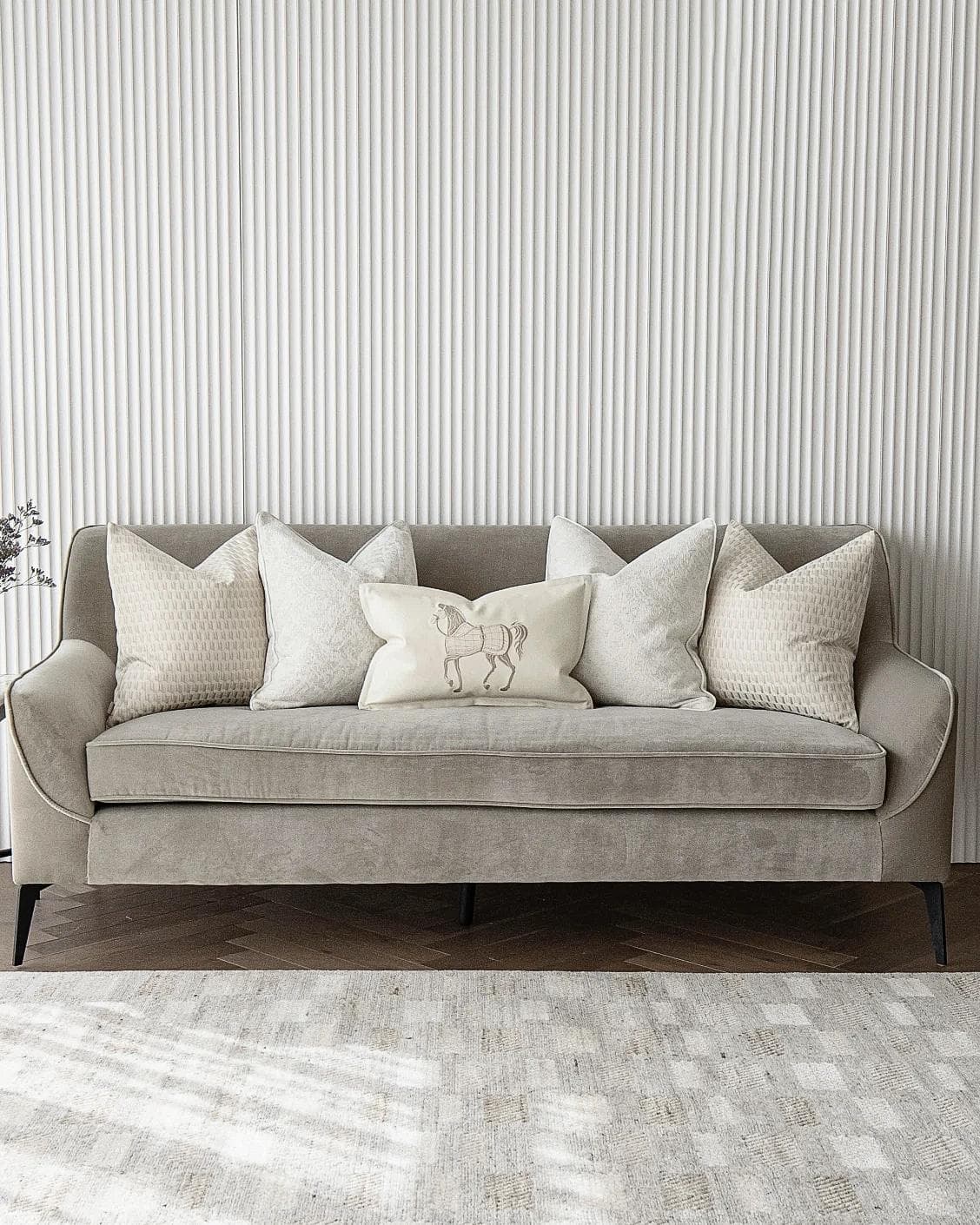 Carmi Bundle cushion in white and beige, shown in a lifestyle front view as image 4