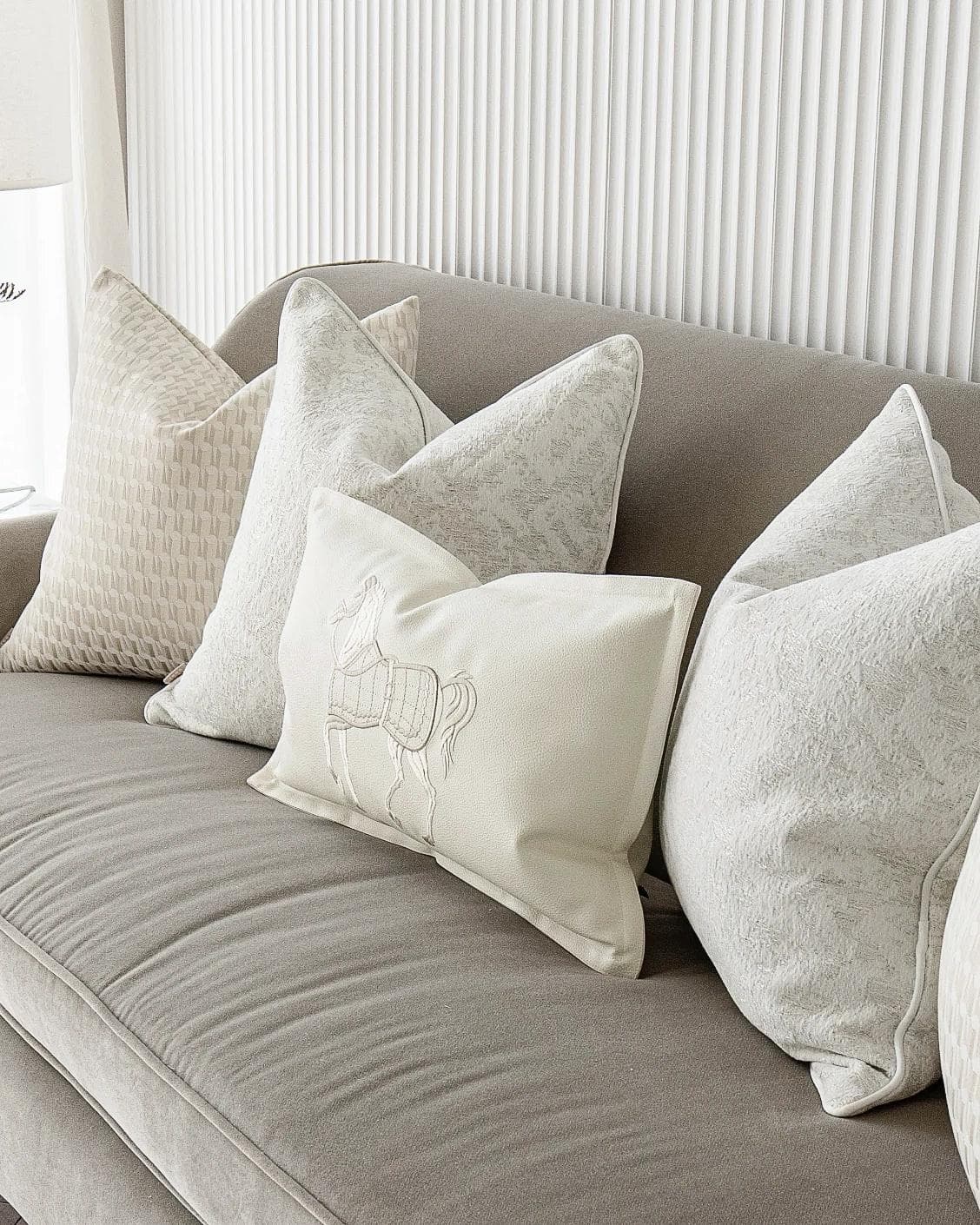 Carmi Bundle cushion in white and beige, shown in a product right view as image 5