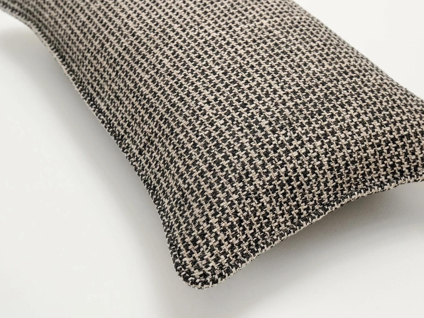 Hugo Steele II cushion in black, shown in a product top view as image 6