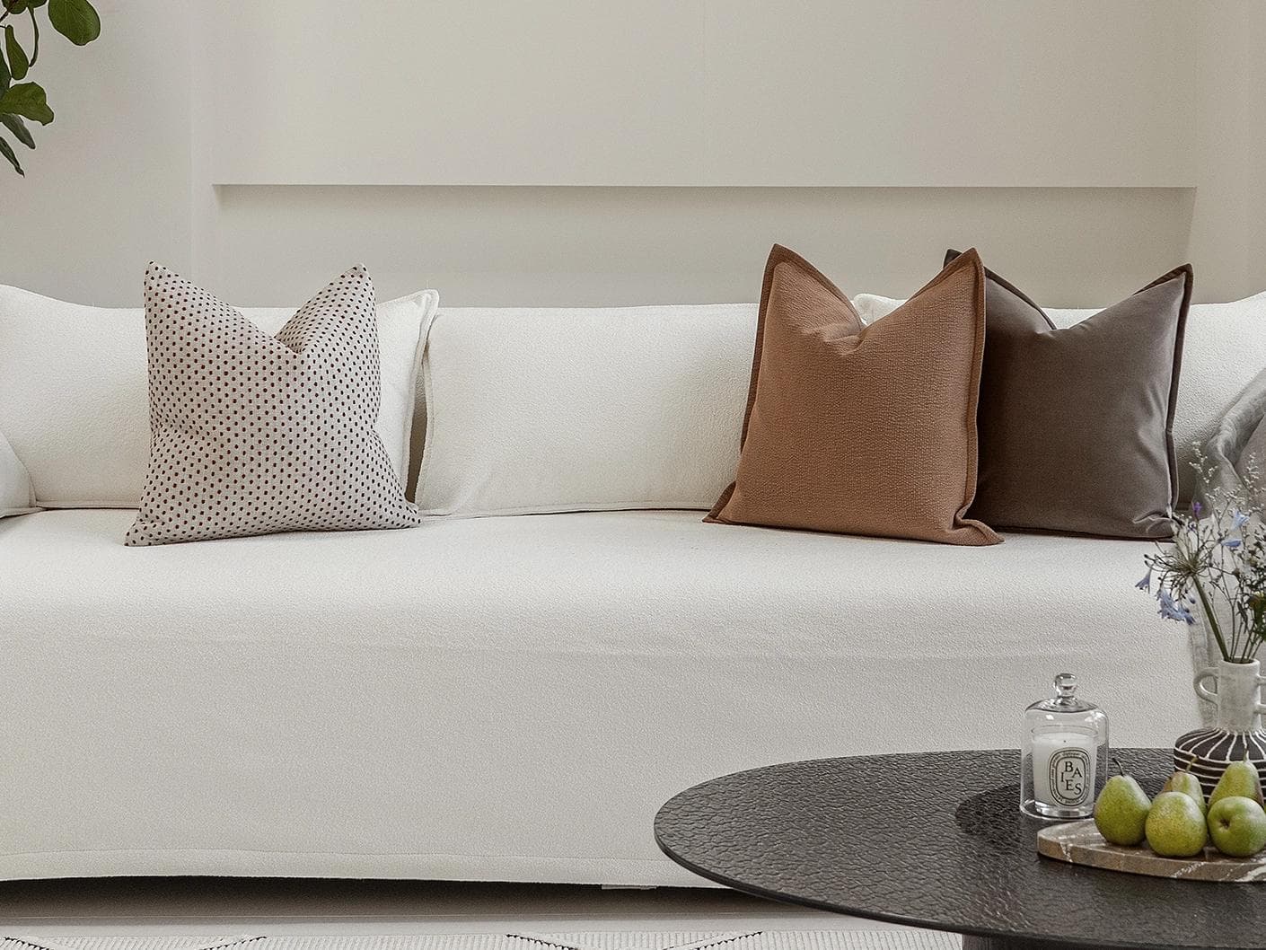 Abhishek Bundle cushion in brown and rust, shown in a lifestyle front view as image 4