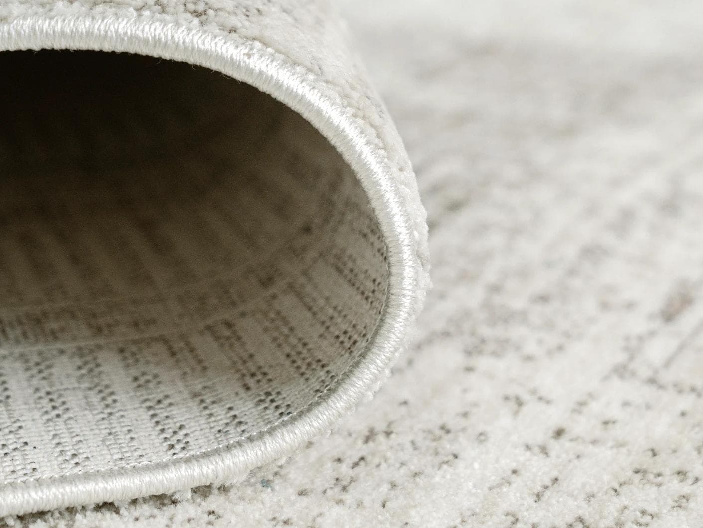 Ada Ivory carpets in taupe, shown in a product close-up front view as image 2