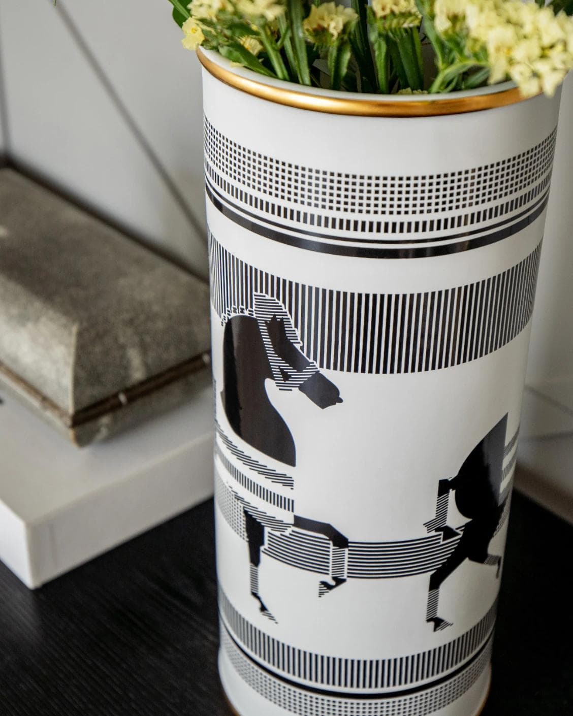 Aurora Arneson vases in white and black, shown in a lifestyle close-up as image 4