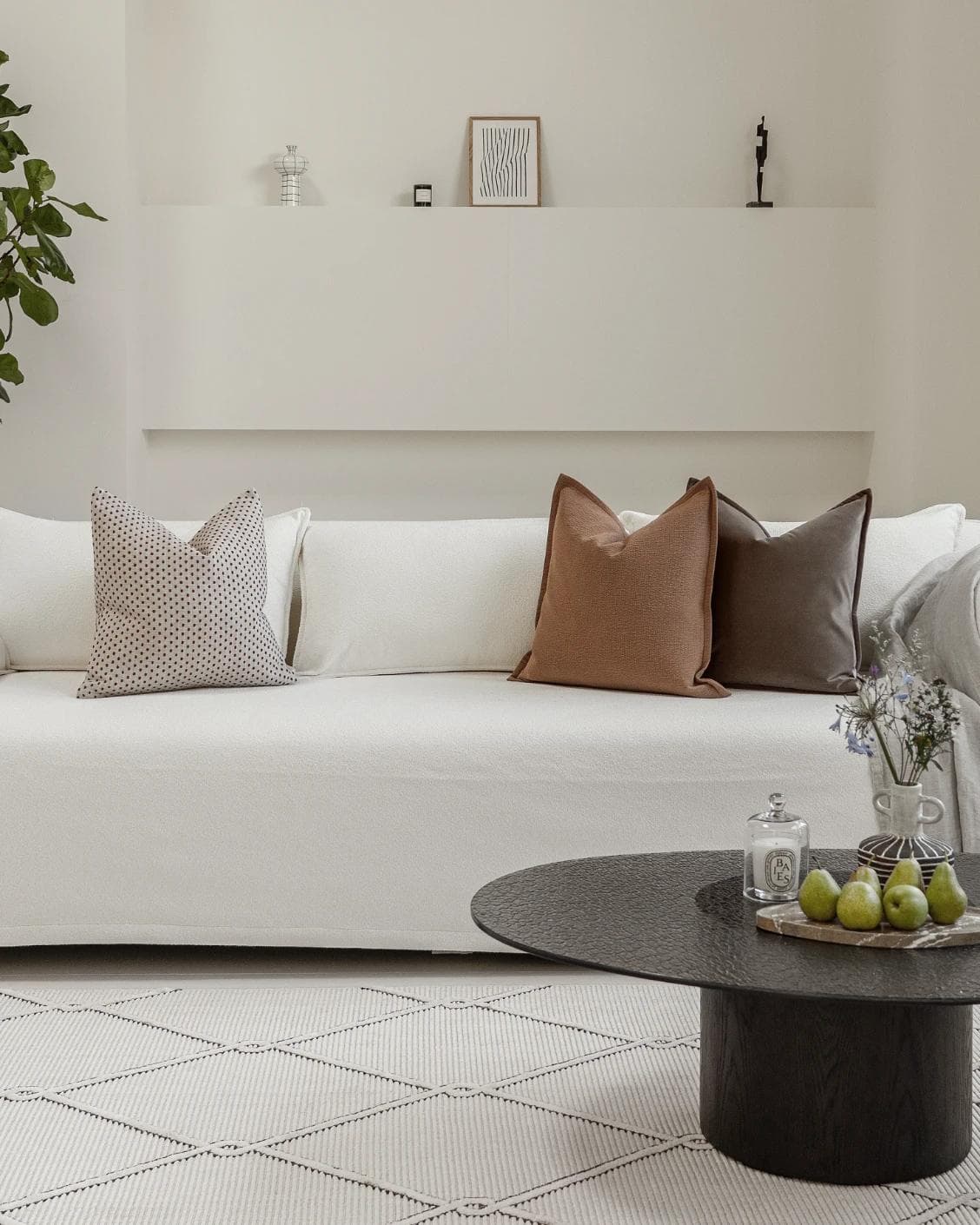 Abhishek Bundle cushion in brown and rust, shown in a lifestyle front view as image 4