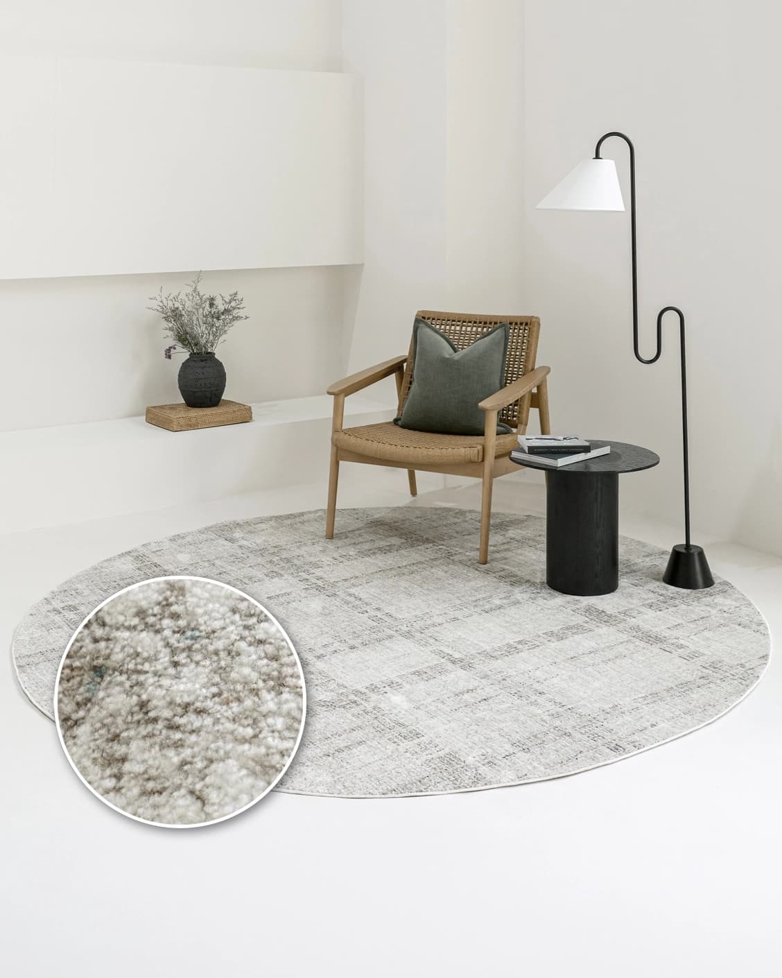 Ada Ivory Round carpet in taupe, shown in a lifestyle front view