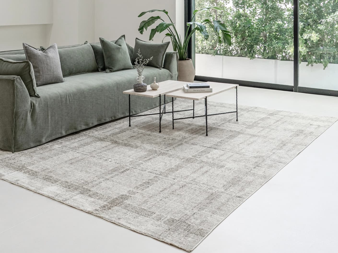 Ada Ivory carpets in taupe, shown in a lifestyle left view as image 3