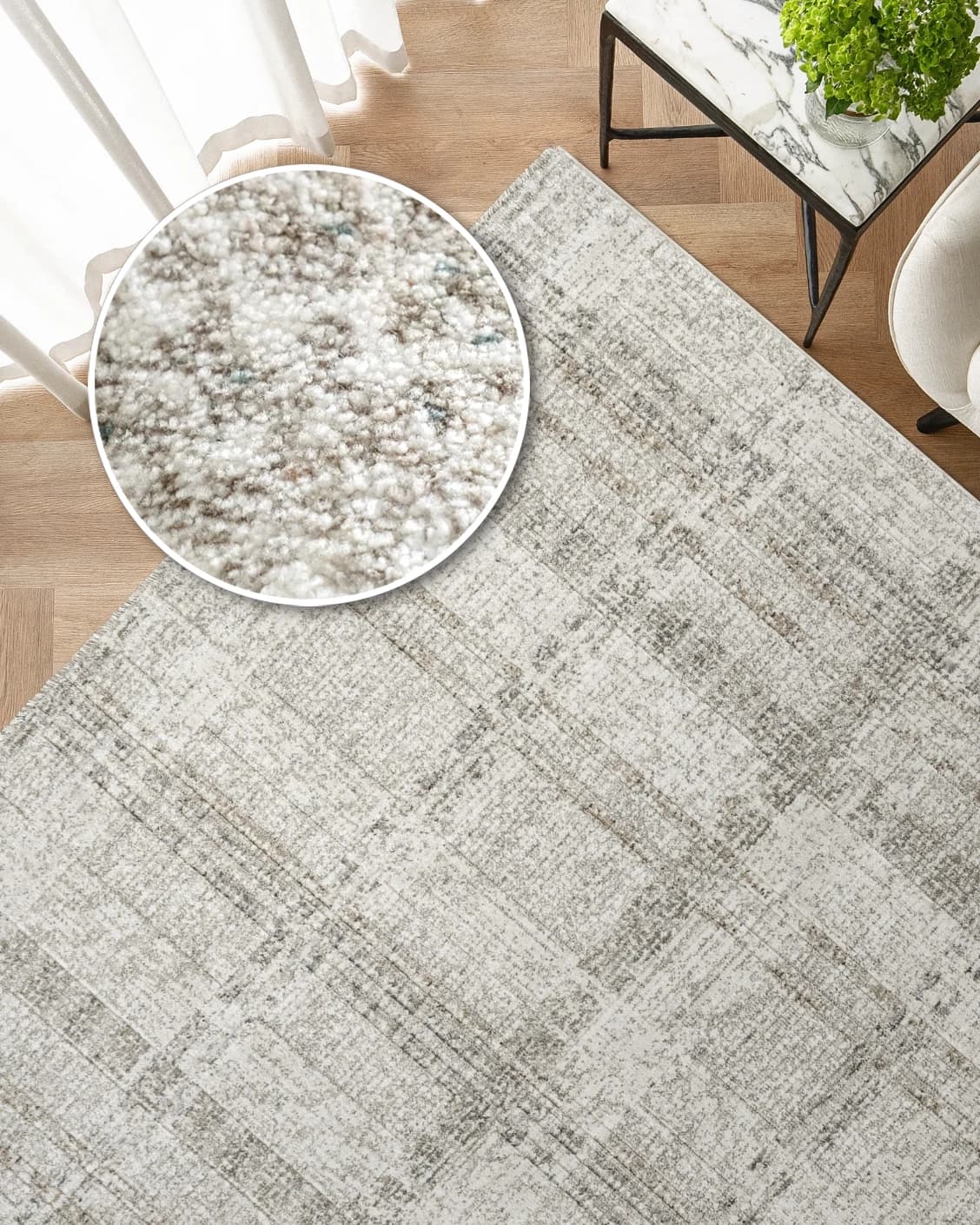 Ada Ivory carpet in ivory and taupe, shown in a lifestyle top view as image 2