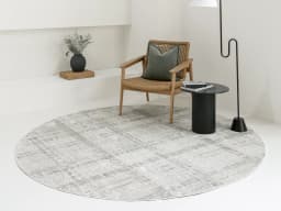 Ada Ivory Round carpet in taupe, shown in a lifestyle front view
