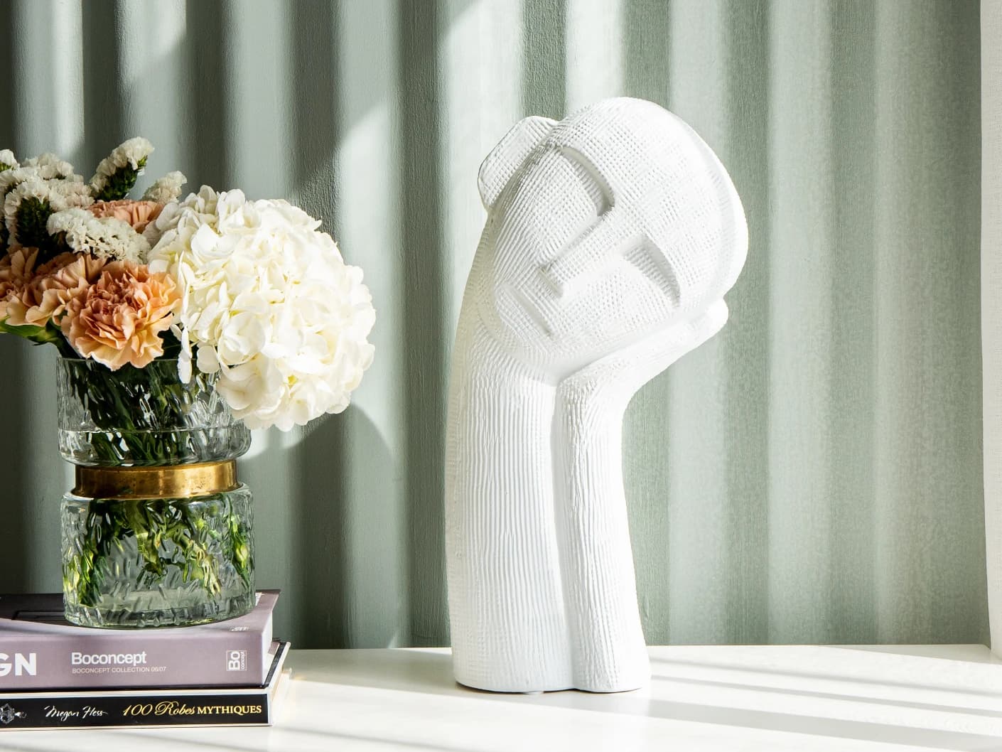 Addie Arneson statues and sculptures in white, shown in a lifestyle front view