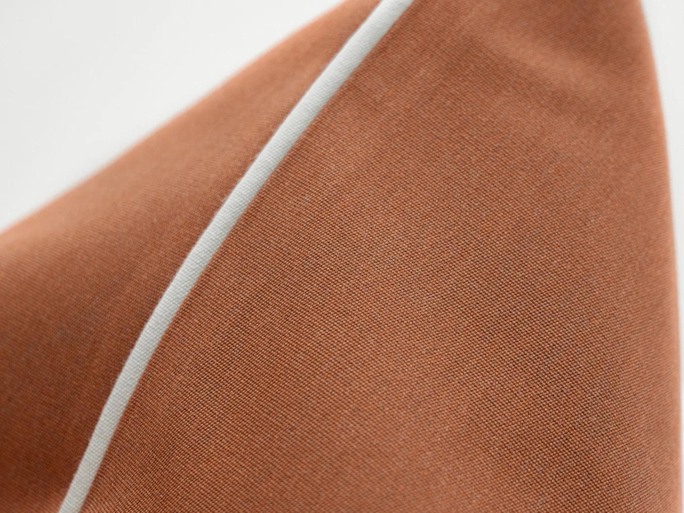 Aelia Clay cushion in rust, shown in a product front view as image 8