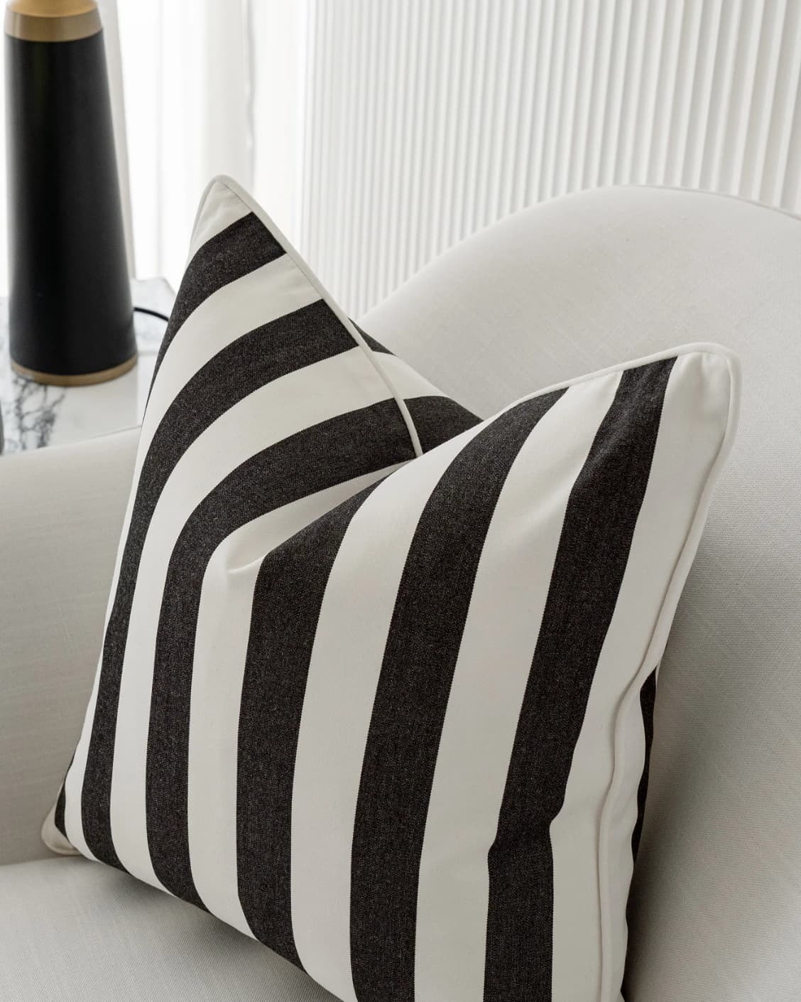 aelia-ebony-black-outdoor-lifestyle-right-view-cushion-id-AR101858.webp