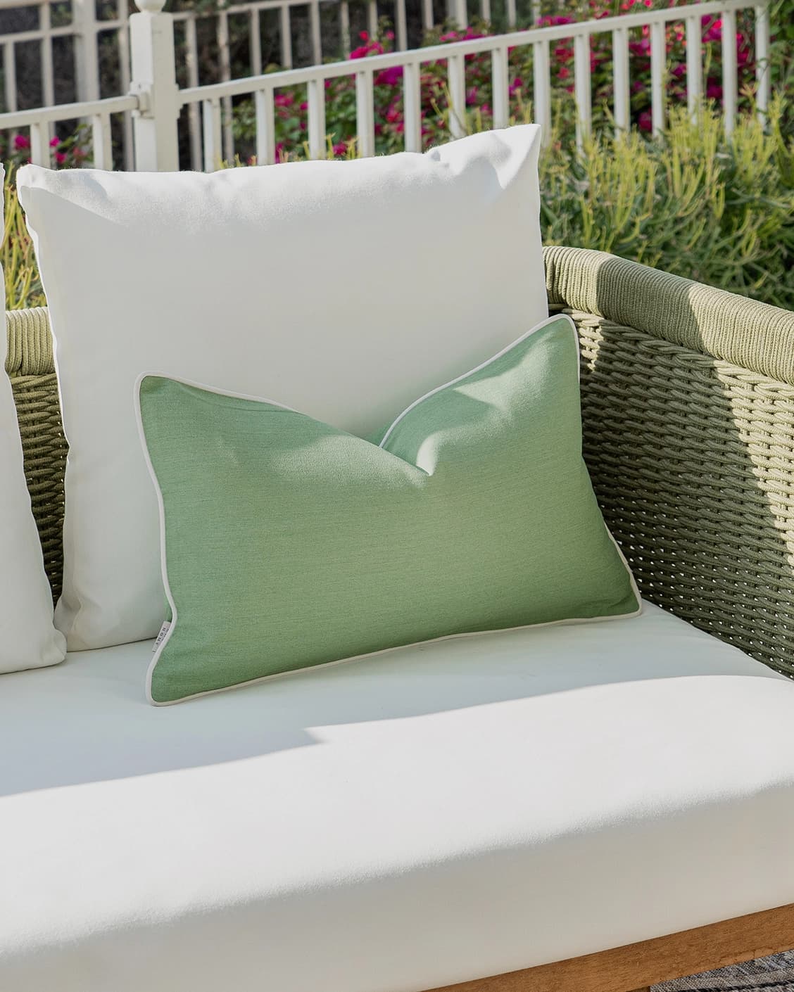 Aelia Fern II cushion in forest green and green, shown in a lifestyle left view as image 2