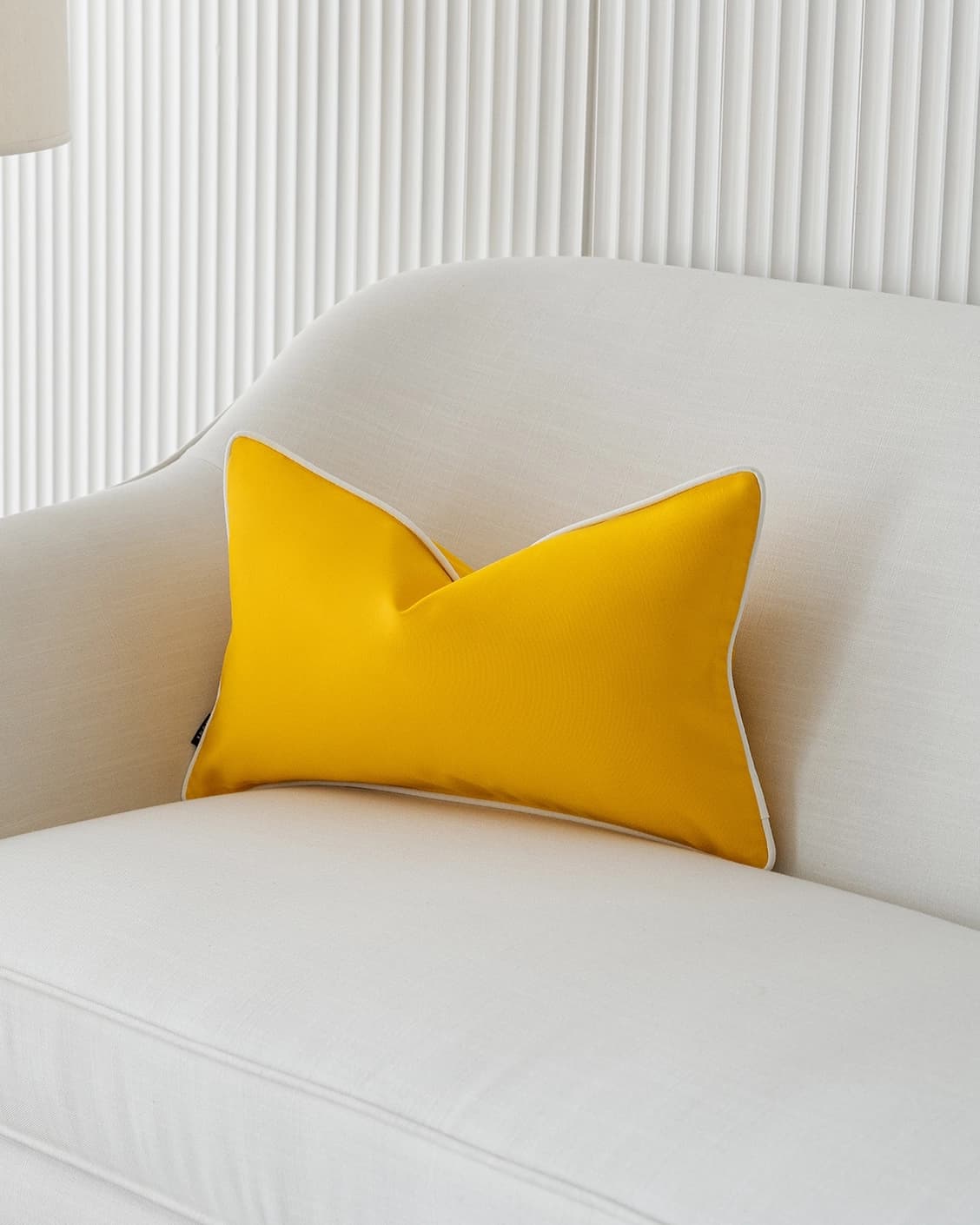 Aelia Klimt II cushion in yellow and ivory, shown in a lifestyle right view as image 2