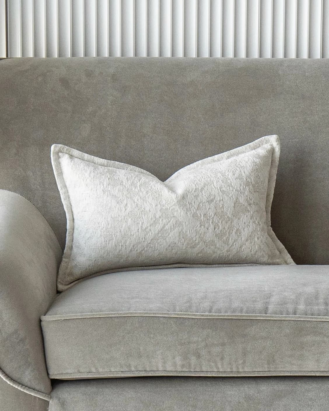 Aidan Bianca cushion in white, shown in a lifestyle front view as image 2