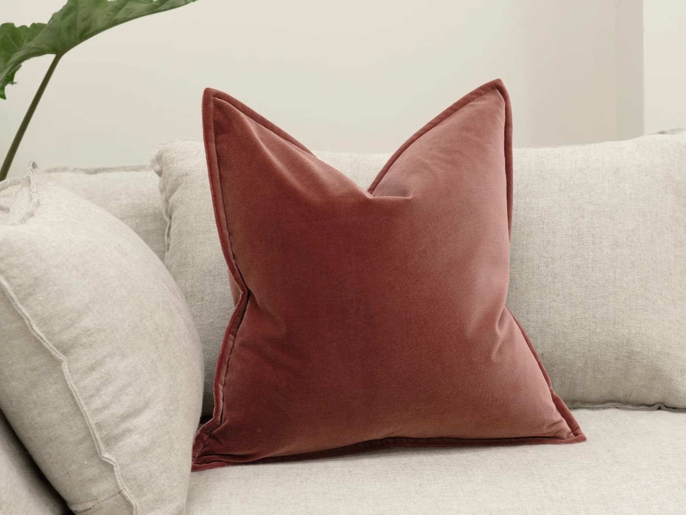 Alessandra Berry single cushions in red and pink, shown in a product front view