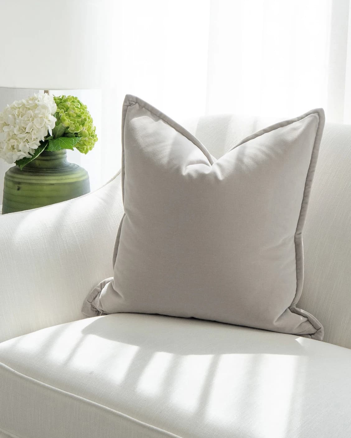 Alessandra Klimt cushion in beige, shown in a lifestyle front view as image 2