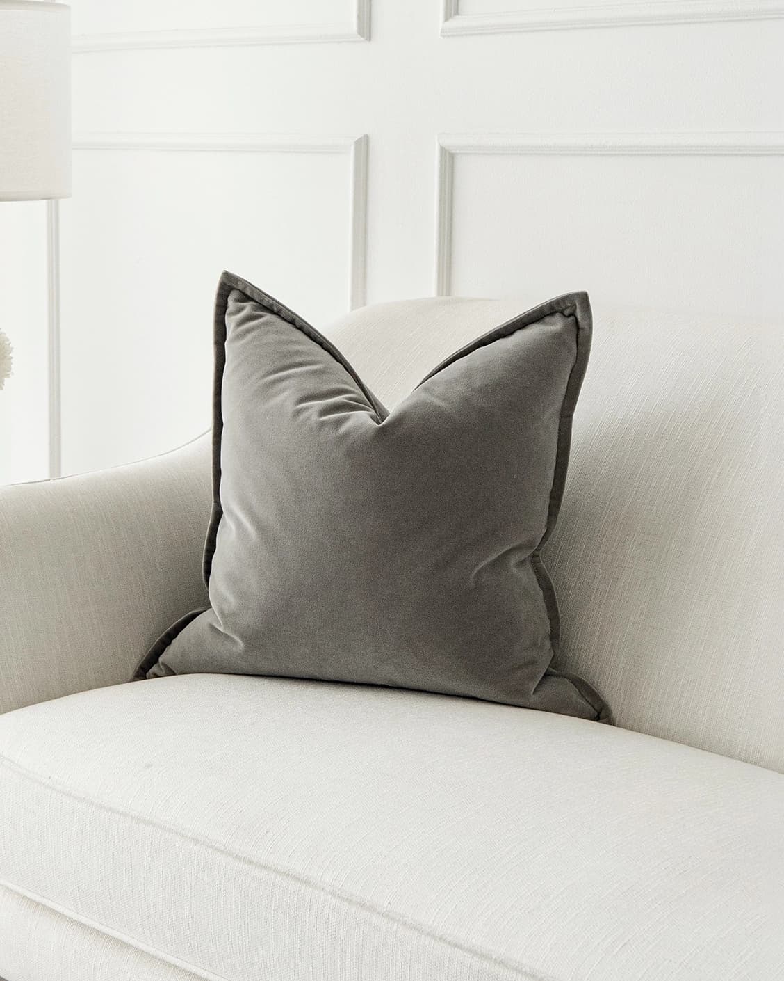 Alessandra Laurent cushion in grey, shown in a lifestyle front view as image 2