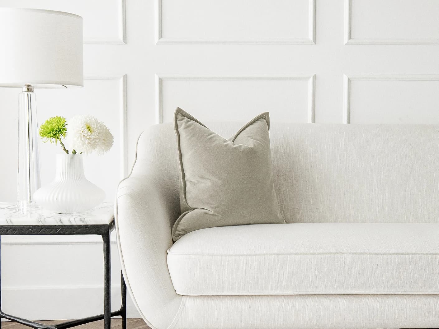 Alessandra Taupe single cushions in taupe, brown and grey, shown in a lifestyle front view