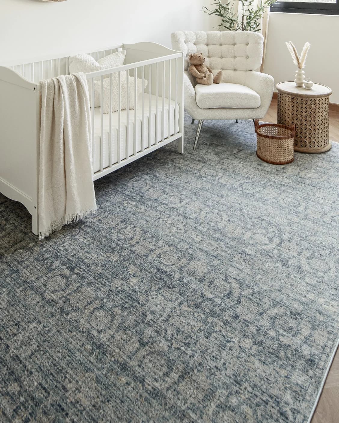 Alexander Azure carpet in blue, shown in a lifestyle left view as image 5