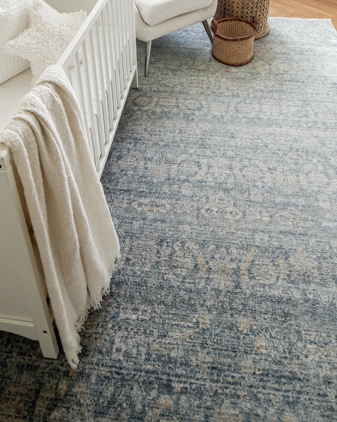 Alexander Azure carpet in blue, shown in a lifestyle left view as image 6