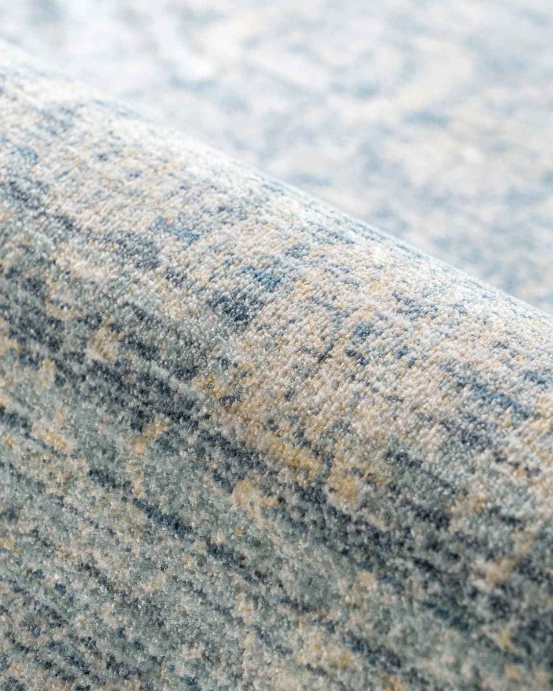 Alexander Azure carpet in blue, shown in a product close-up top view as image 12
