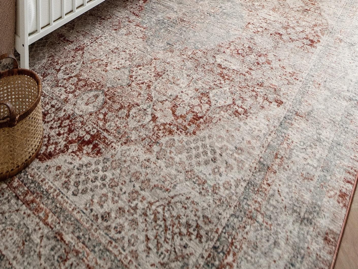 Alexander Rosso carpets in red and beige, shown in a lifestyle close-up as image 1