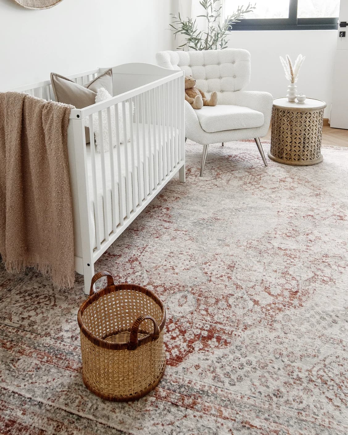Alexander Rosso carpet in red and beige, shown in a lifestyle left view as image 9