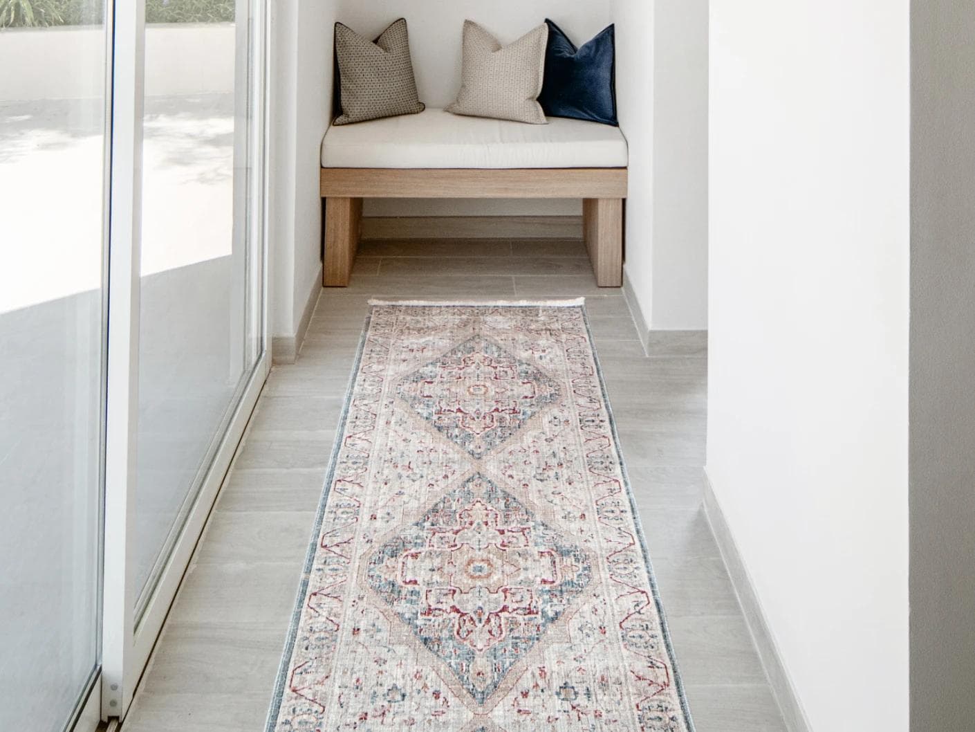 Alexander Rouge Runners carpet in beige, blue and red, shown in a lifestyle front view as image 2
