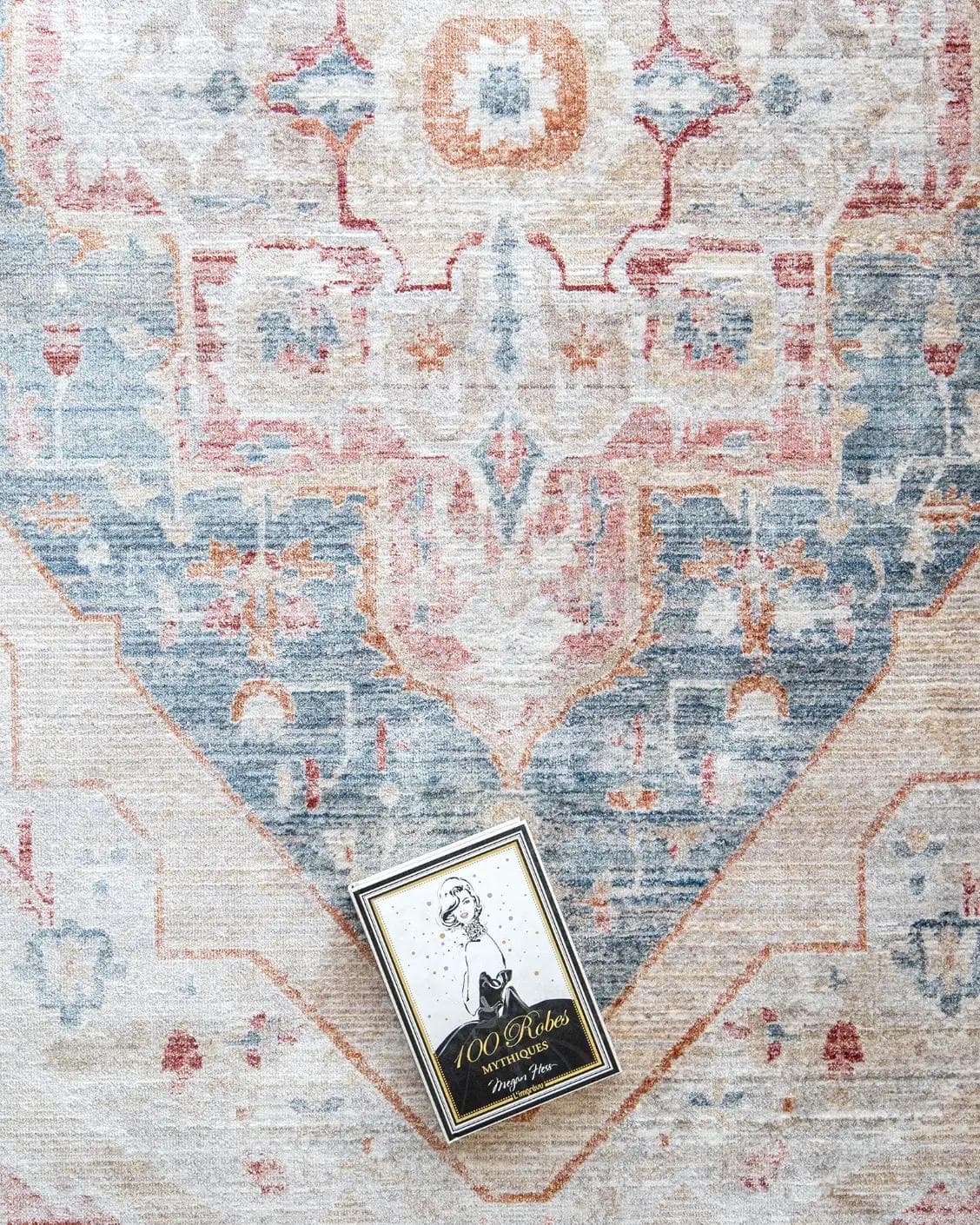 Alexander Rouge Runners carpet in beige, blue and red, shown in a lifestyle top view as image 7