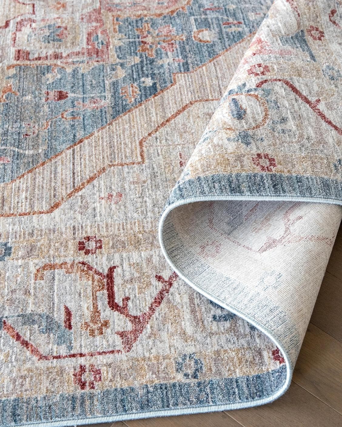 Alexander Rouge Runners carpet in beige, blue and red, shown in a product close-up as image 8