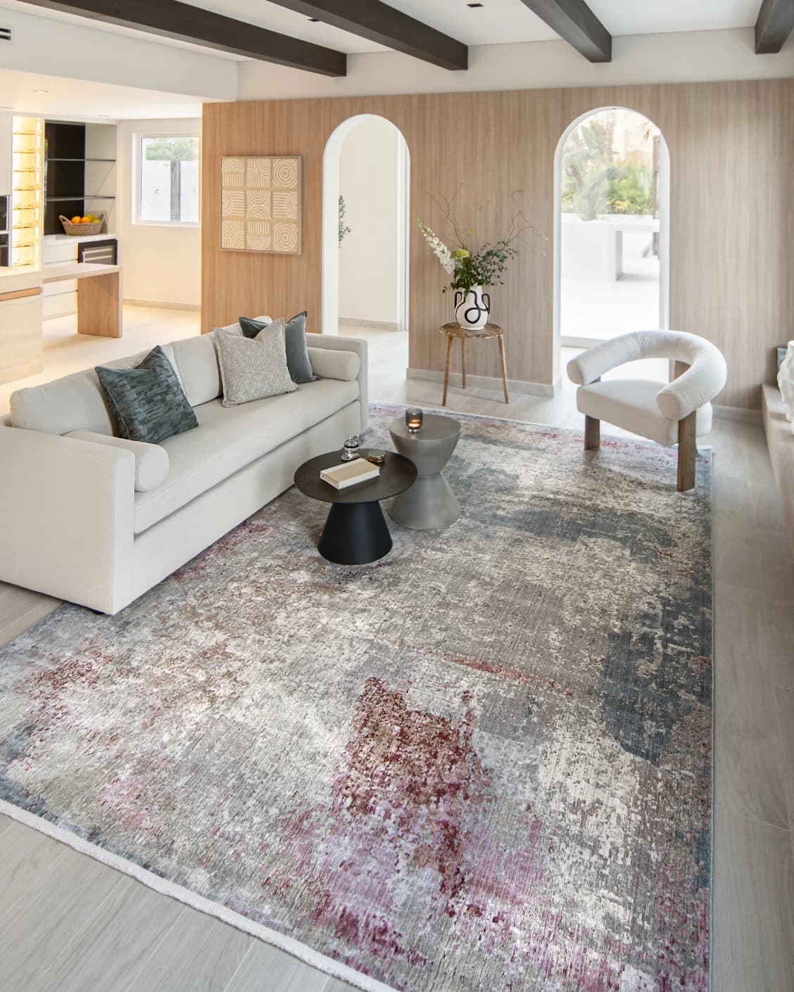 Alexander Russell carpet in beige, rust and blue, shown in a lifestyle left view as image 7