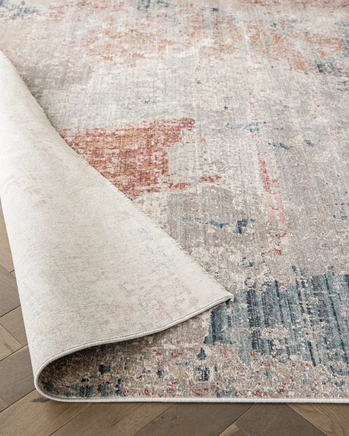 Alexander Russell carpet in beige, rust and blue, shown in a product close-up front view as image 9