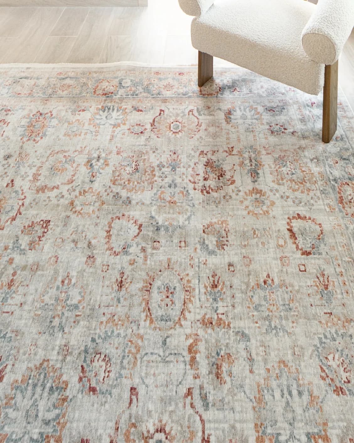 Alexander Sandy carpet in beige and red, shown in a lifestyle close-up top view as image 5