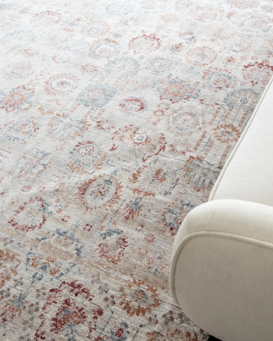Alexander Sandy carpet in beige and red, shown in a lifestyle top view as image 10