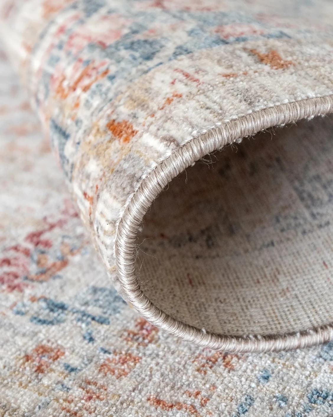 Alexander Sandy carpet in beige and red, shown in a product close-up as image 12