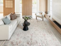 Alexander Sandy carpet in sandy, beige and red, shown in a lifestyle front view