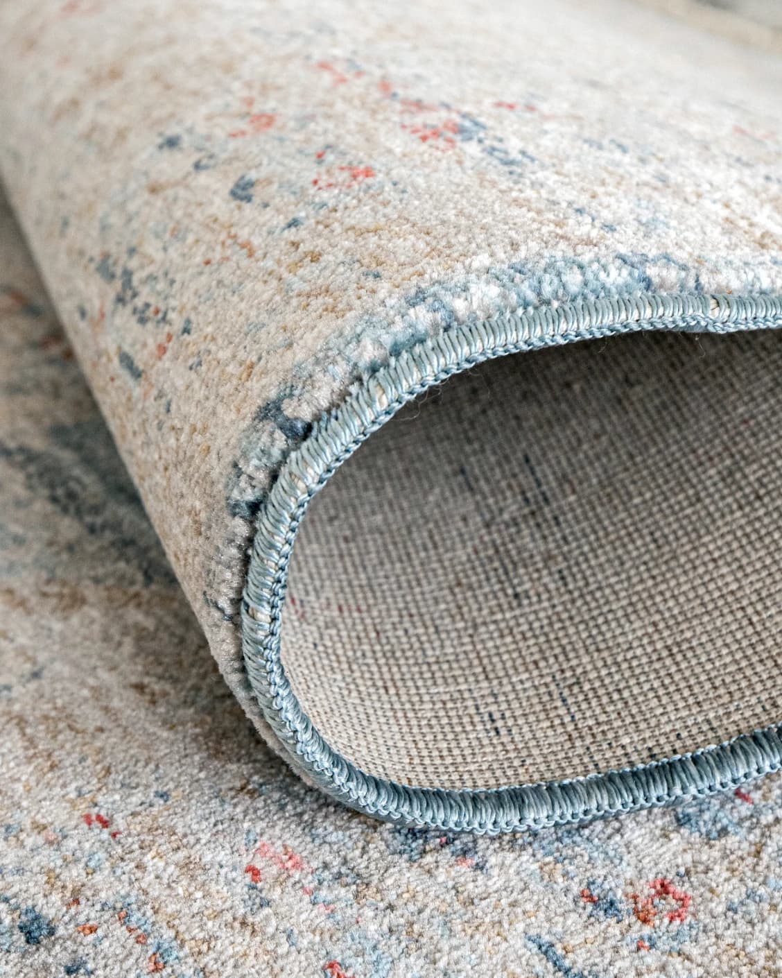 Alexander Sky carpet in pale blue, blue and beige, shown in a product close-up as image 9