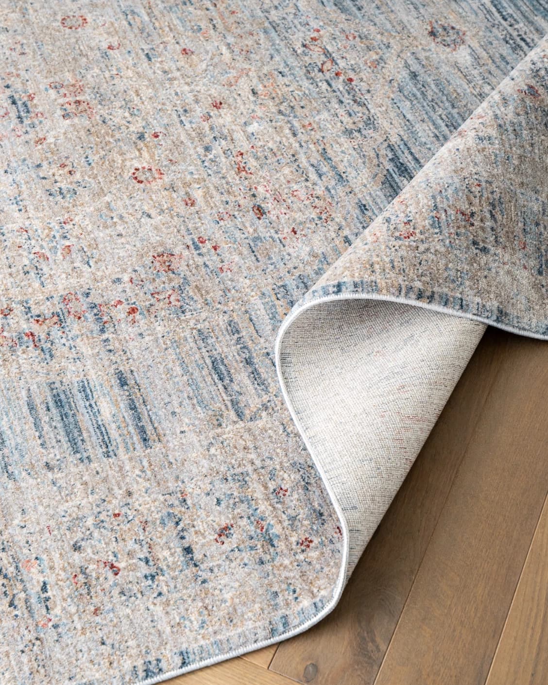 Alexander Sky carpet in pale blue, blue and beige, shown in a product close-up top view as image 12