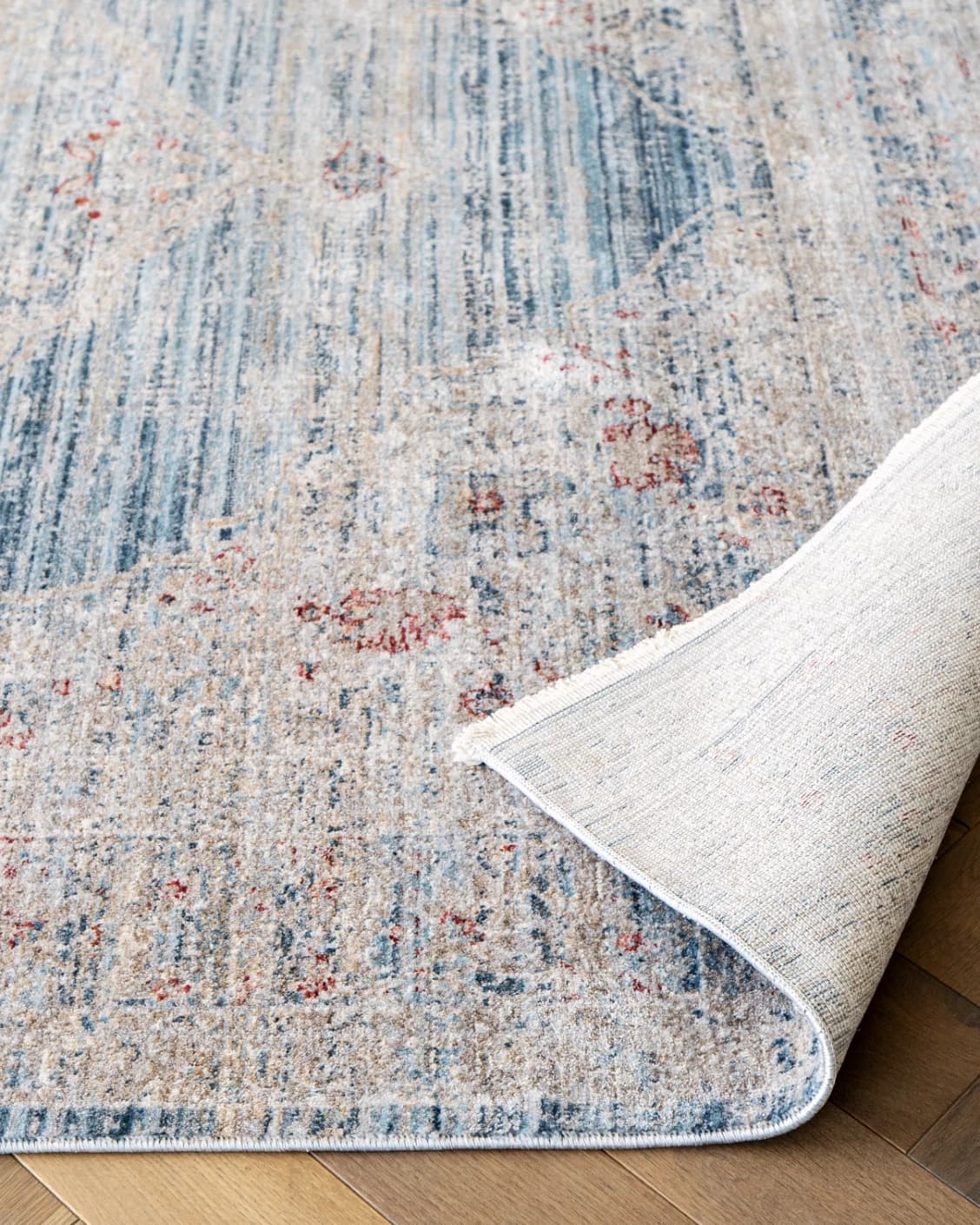 Alexander Sky carpet in pale blue, blue and beige, shown in a product front view as image 13