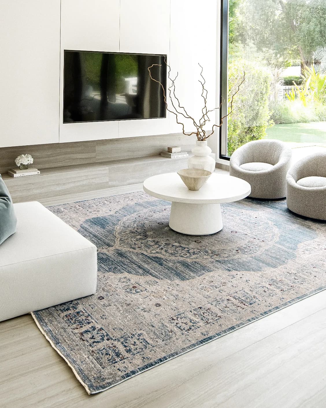 Alexander Sky carpet in pale blue, blue and beige, shown in a product left view as image 14
