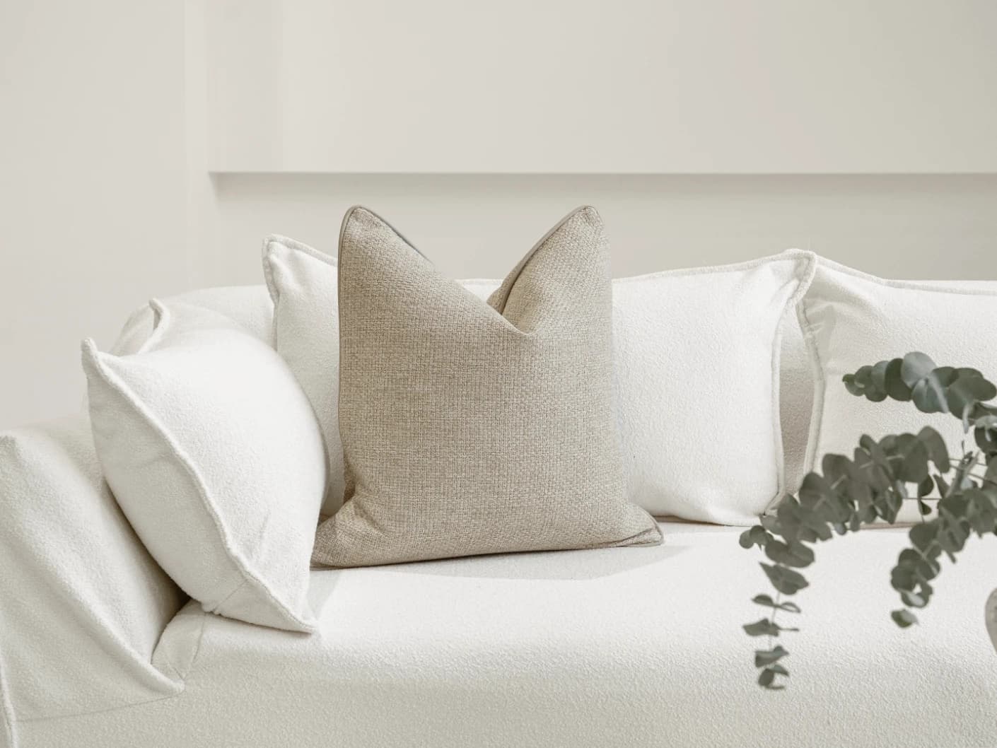 Alin Klimt single cushions in beige and taupe, shown in a product front view