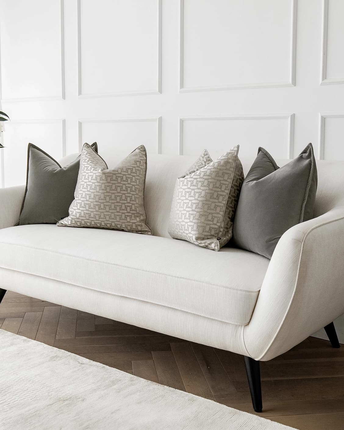 Amara Bundle cushion in grey, beige and silver, shown in a lifestyle right view as image 2