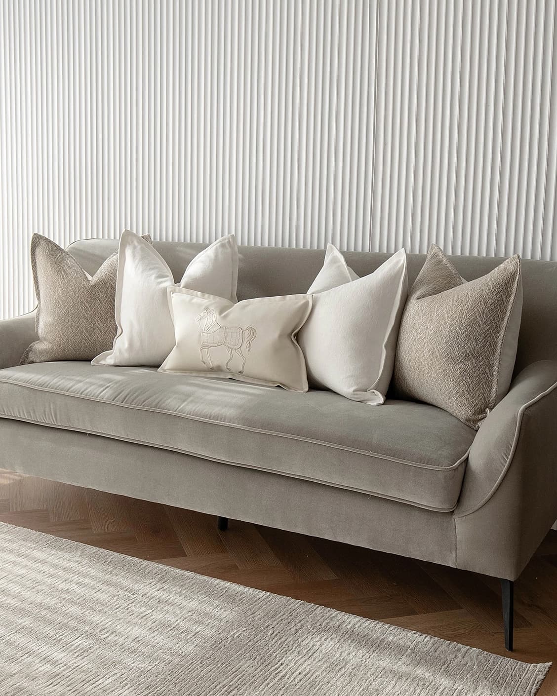 Antonio Bundle cushion in white and beige, shown in a lifestyle right view as image 2